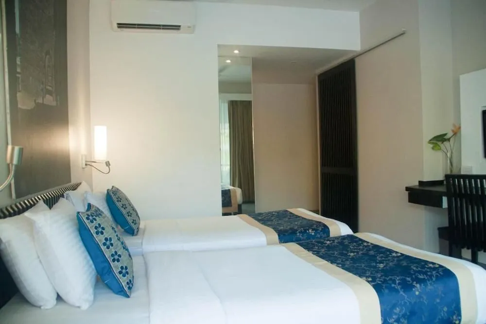 Whispering Palms Beach Resort Room