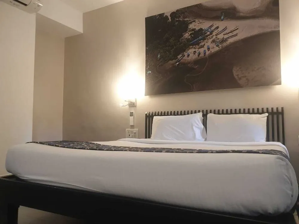 Whispering Palms Beach Resort Room