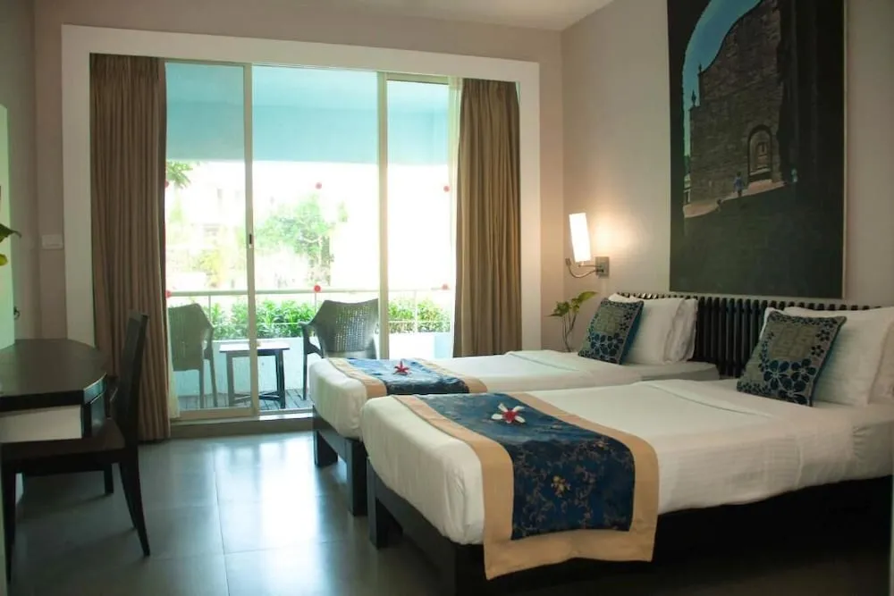 Whispering Palms Beach Resort Room