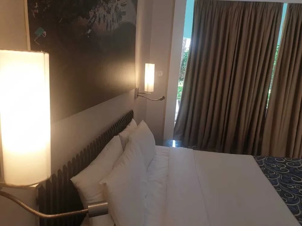 Whispering Palms Beach Resort Room