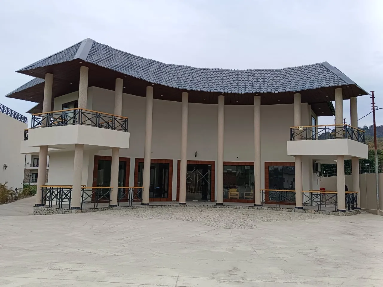 Shervani Pebbles and Pines Corbett Facade