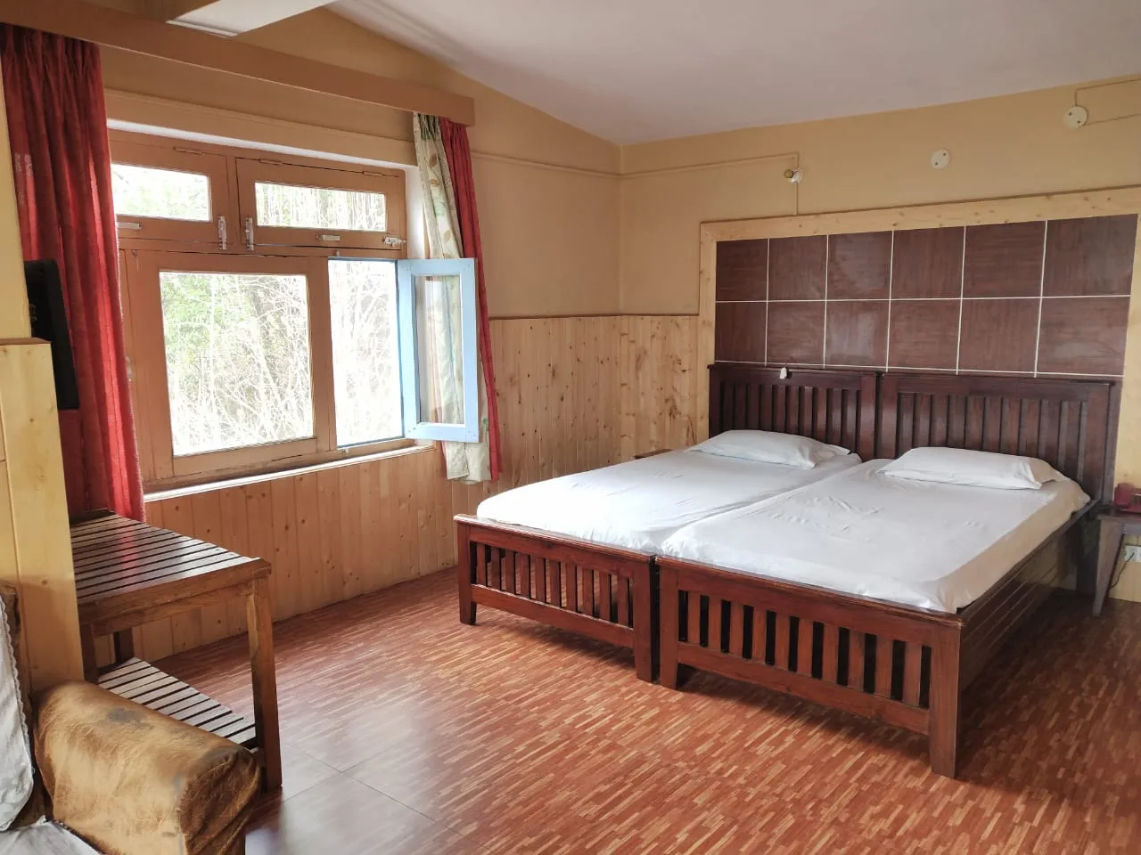 Trishul Orchard Resort Room