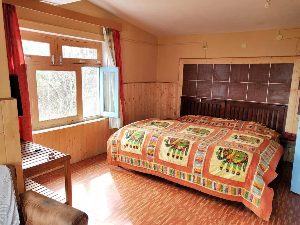 Trishul Orchard Resort Room