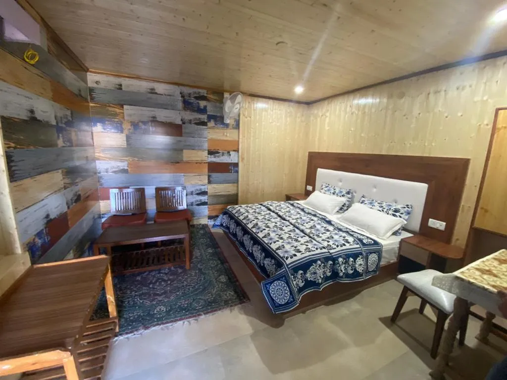 Trishul Orchard Resort Room