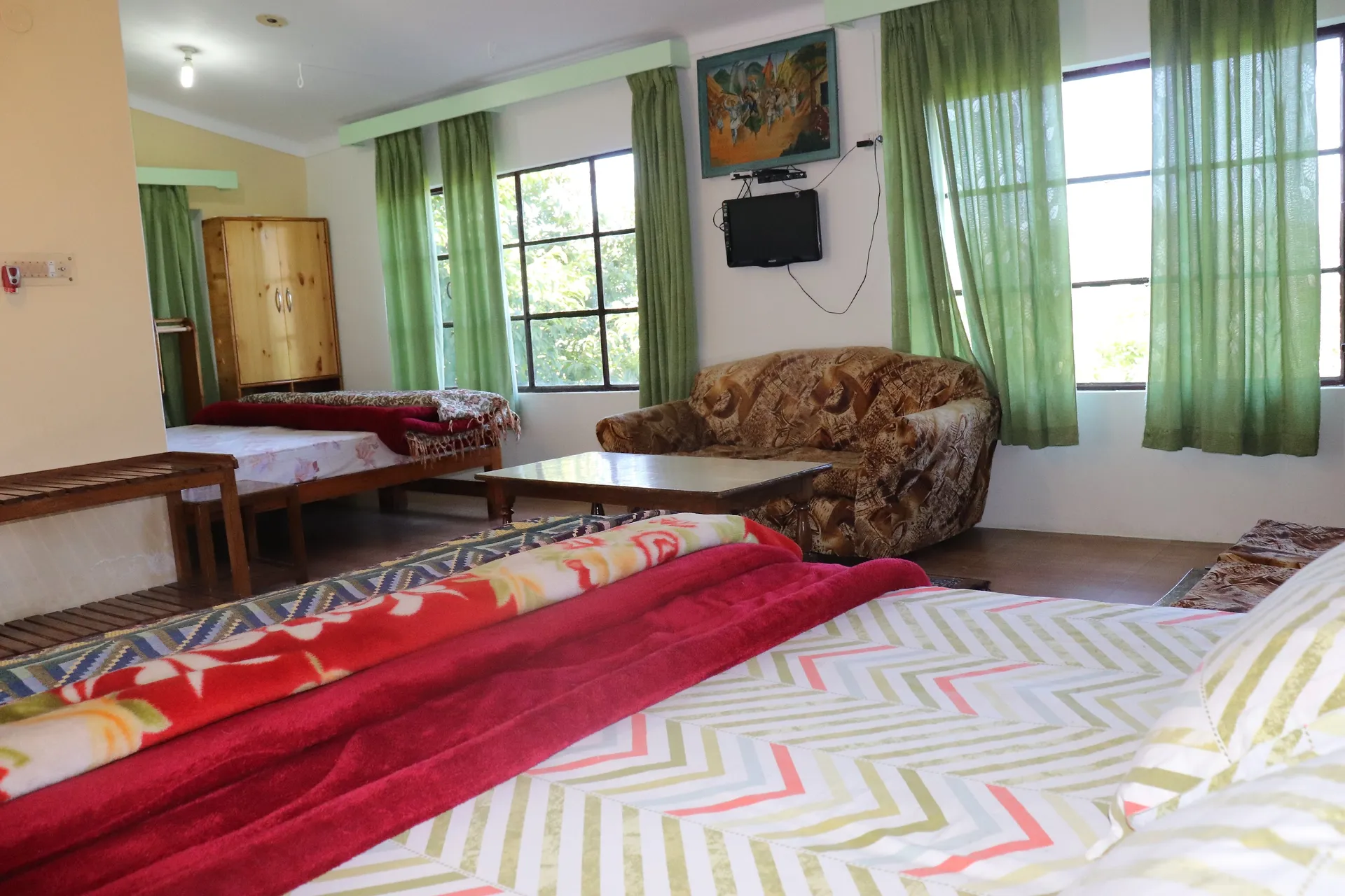 Trishul Orchard Resort Room