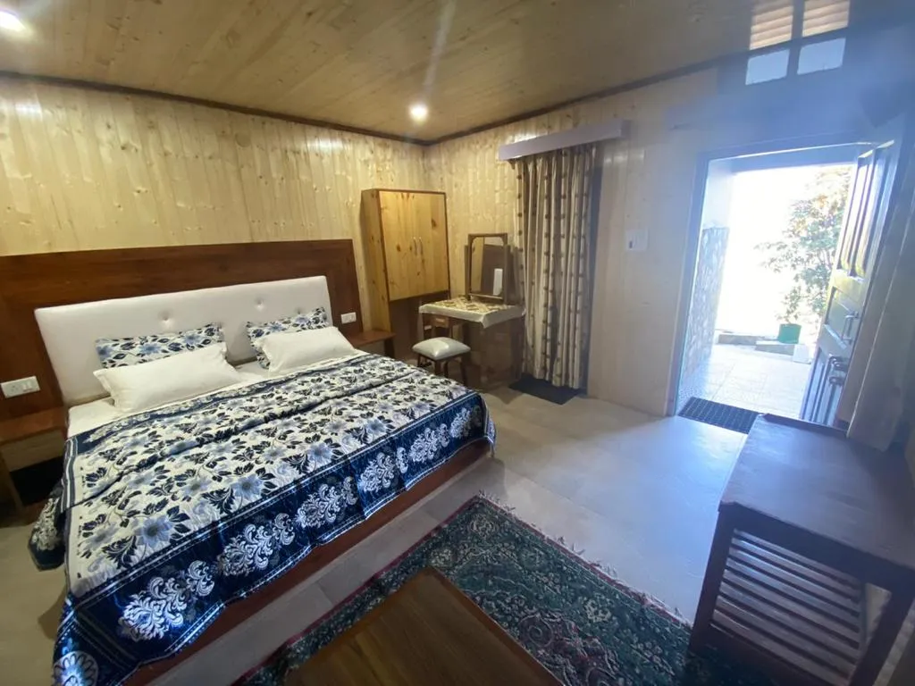 Trishul Orchard Resort Room