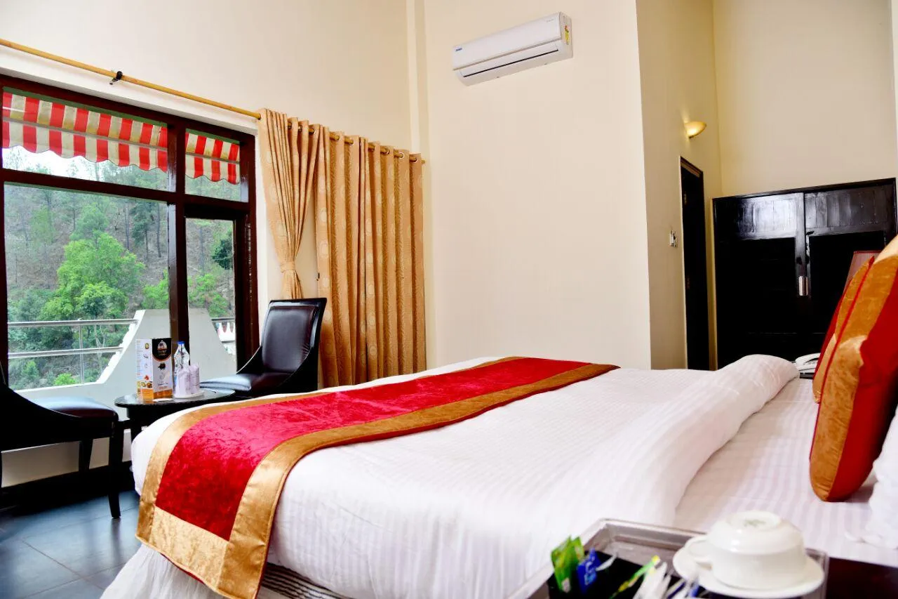 Vaapi Comfort Inn (A Unit Of SAM Hotels) Room