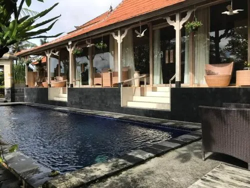 Tri Dewi Residence by GenuineHost Room